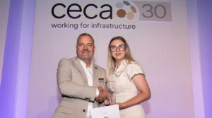 Gabriela receives the award from CECA Southern Chair, Kevin Valentine.