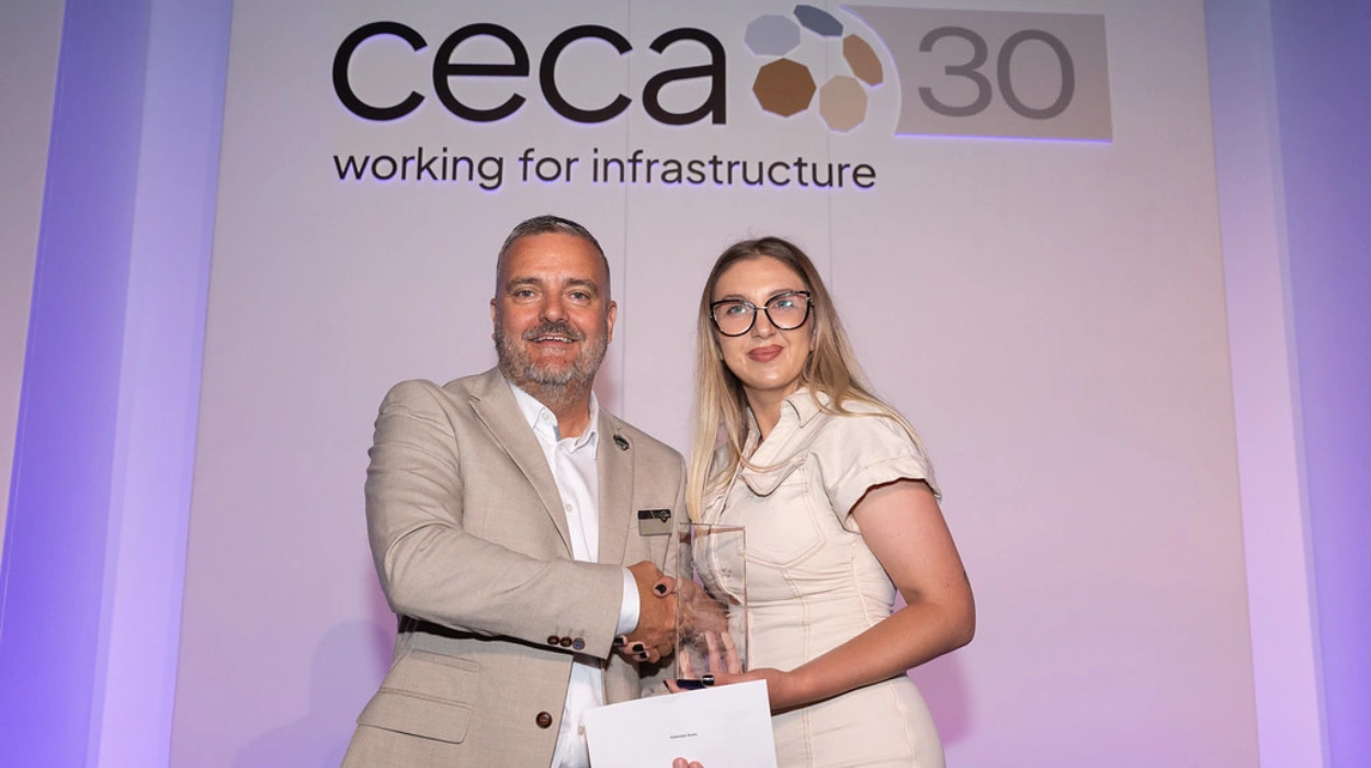 Gabriela receives the award from CECA Southern Chair, Kevin Valentine.
